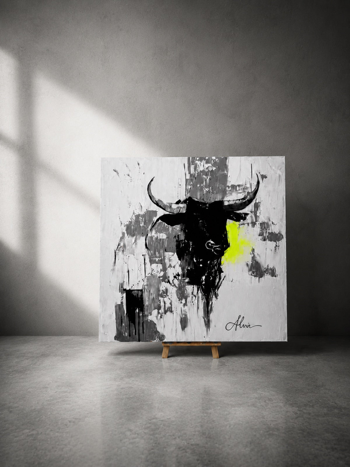 The painting on a wooden easel in a bare room, side light raking across the canvas